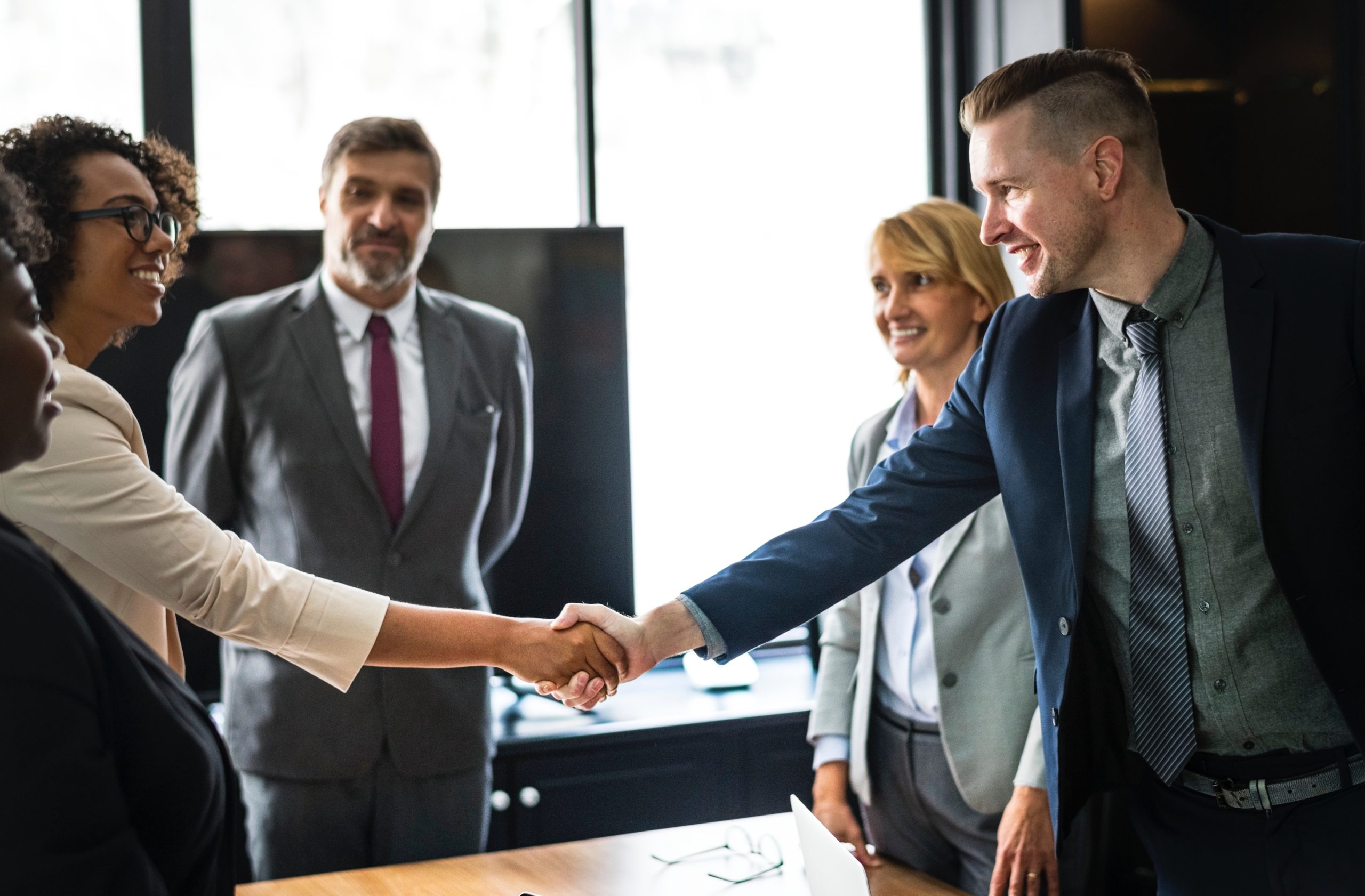 business people shake hands after a job interview