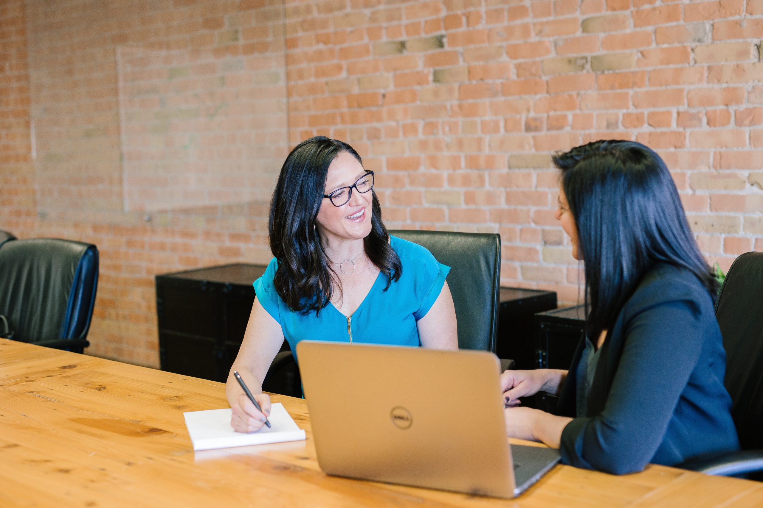 Two business women in a job interview. San Diego Headhunters concept.